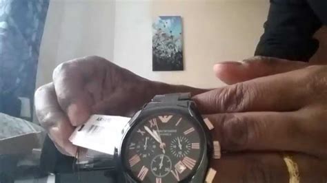 real armani watch vs fake|real watch vs fake watch.